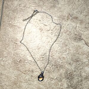 Elegant Silver Necklace with Amber Pendant